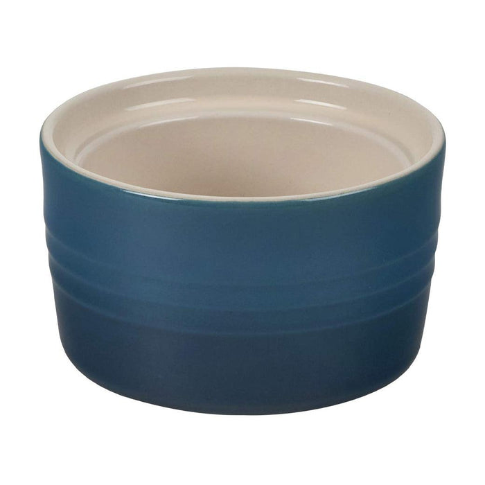 Deep teal Le Creuset 7 oz Stoneware Stackable Ramekin displayed on a white background