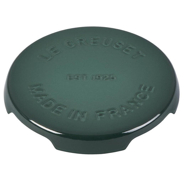 8.8 inch artichaut Le Creuset enameled cast iron signature trivet displayed on a white background