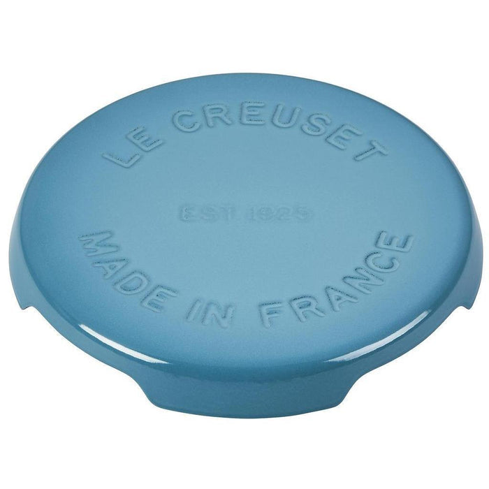 8.8 inch Caribbean Le Creuset enameled cast iron signature trivet displayed on a white background