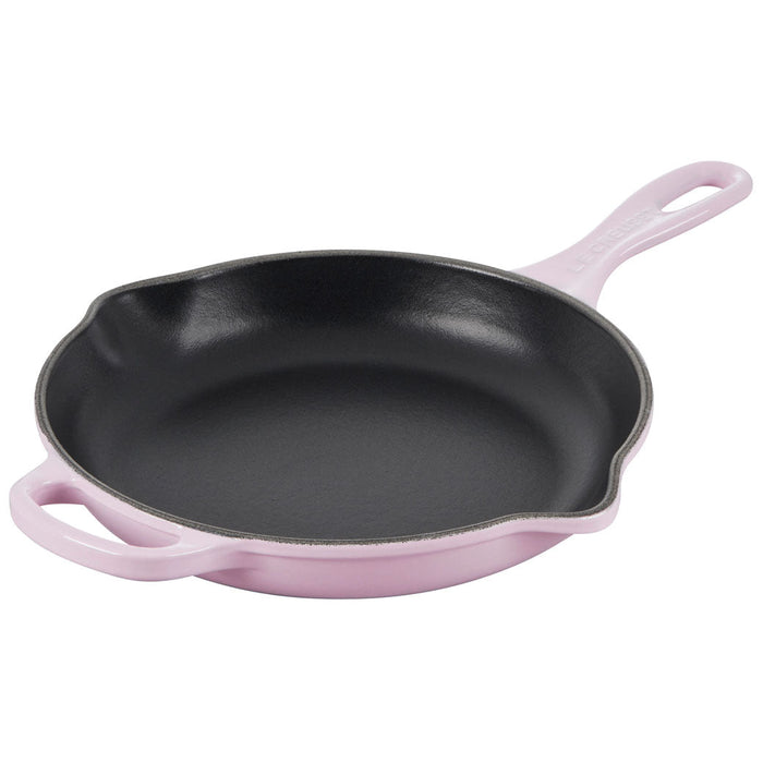 9 inch shallot Le Creuset cast iron skillet displayed on a white background
