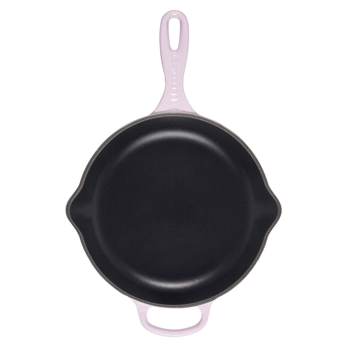 Top view of 9 inch shallot cast iron handle skillet displayed on a white background