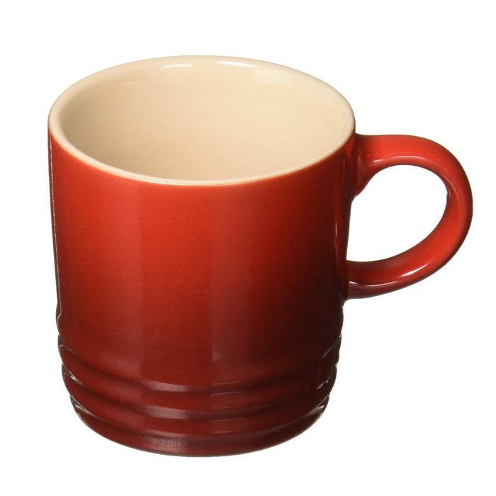 3 oz. Cerise Le Creuset Stoneware Espresso Mug displayed on a white background