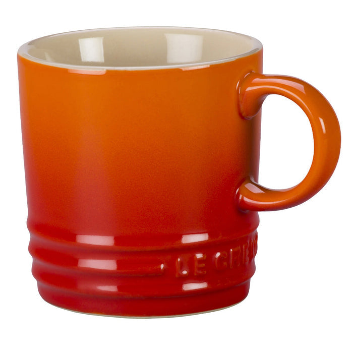 Front view of 3 oz. Flame Le Creuset Stoneware Espresso Mug displayed on a white background