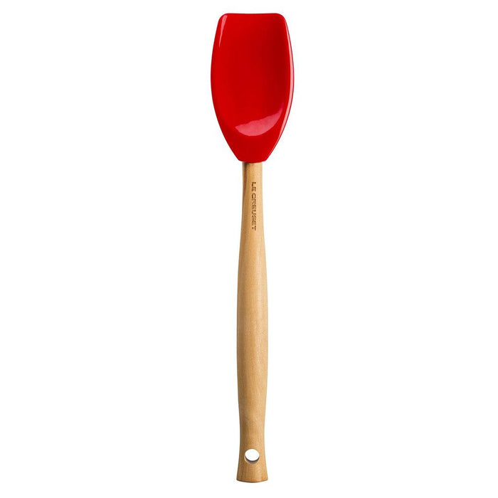 Cerise Le Creuset Spoonula displayed vertically on a white background