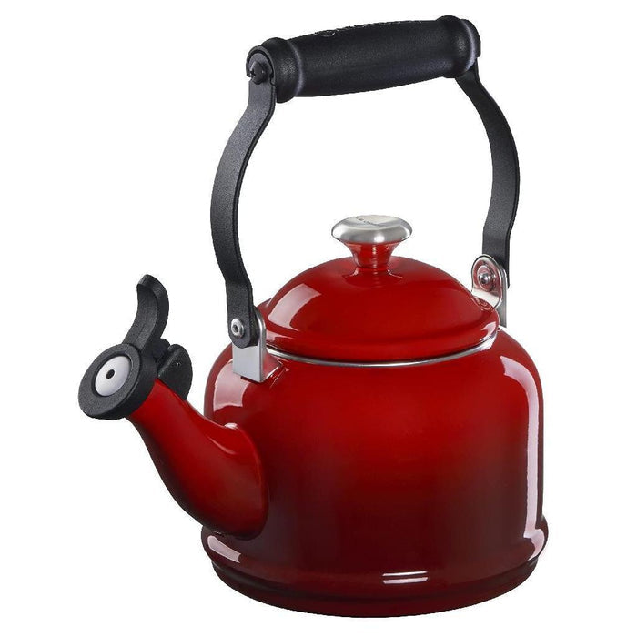1.25 qt cerise Le Creuset enamel on steel demi tea kettle with metal finishes displayed on a white background
