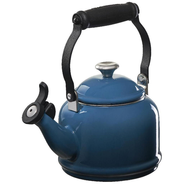 1.25 qt deep teal Le Creuset enamel on steel demi tea kettle with metal finishes displayed on a white background
