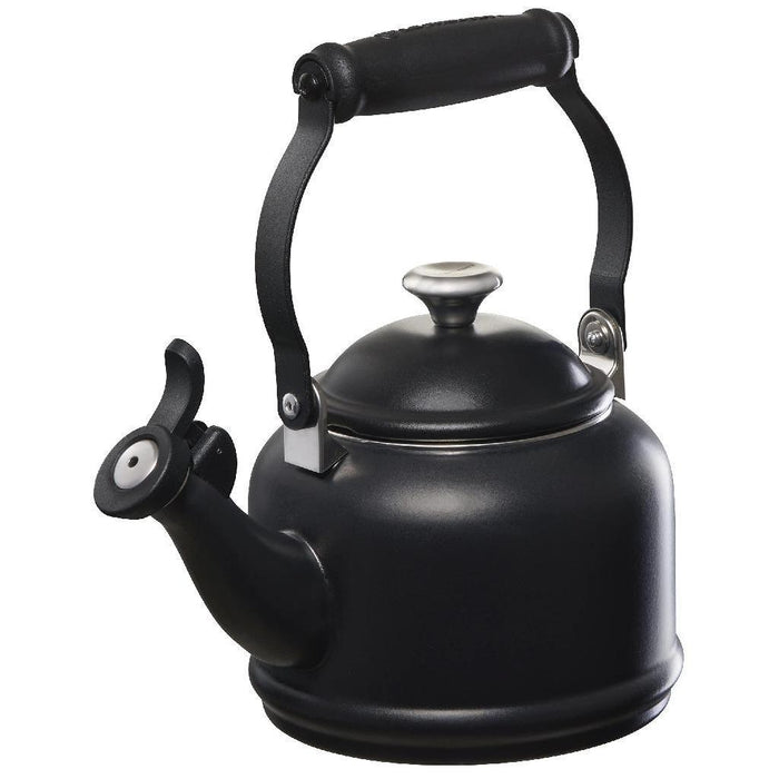 1.25 qt licorice Le Creuset enamel on steel demi tea kettle with metal finishes displayed on a white background