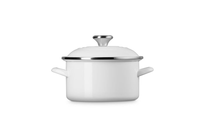 White 3.8 qt enamel on steel traditional petite stockpot with lid and handles on a white background