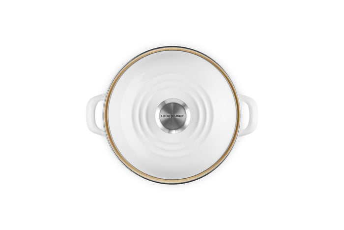 Top view of the white 3.8 qt enamel on steel traditional petite stockpot with lid and handles on a white background