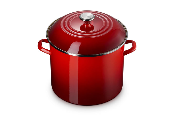 Cerise stockpot with lid and handles on a white background