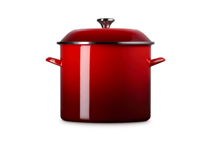 Cerise stockpot with lid and handles on a white background