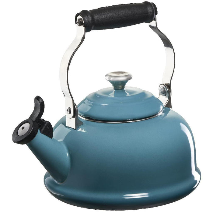 1.7 qt Caribbean Le Creuset enamel on steel whistling teak kettle with metal finishes displayed on a white background