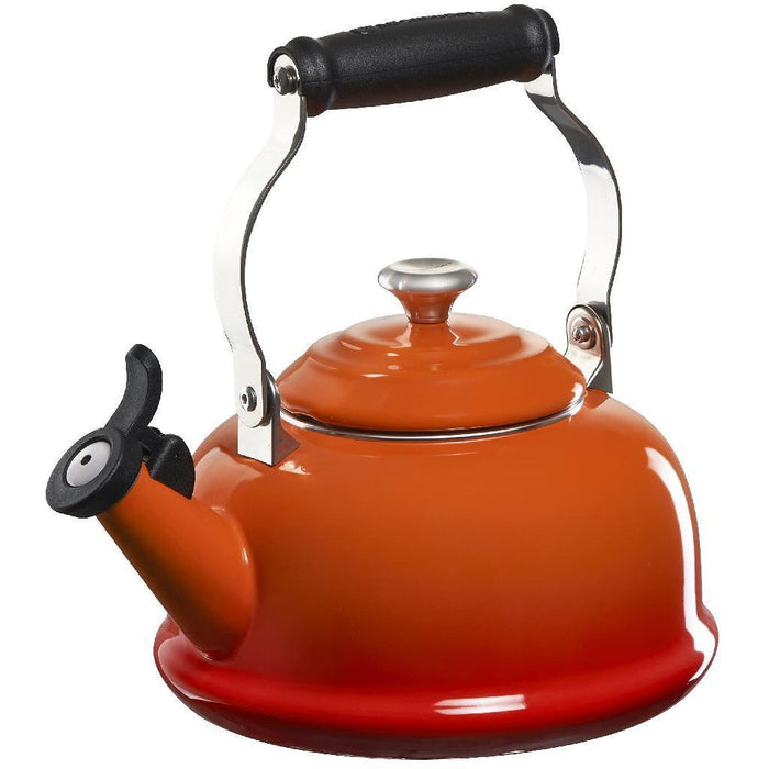 1.7 qt Flame Le Creuset enamel on steel whistling tea kettle with metal finishes displayed on a white background