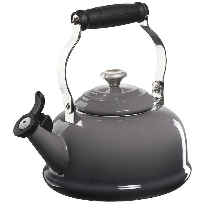 1.7 qt Oyster Le Creuset enamel on steel whistling tea kettle with metal finishes displayed on a white background