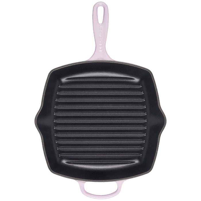 Top view of 10.25 inch shallot Le Creuset enameled cast iron signature square skillet grill with handle displayed vertically on a white background