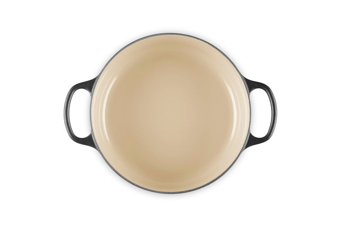 Top view of 3.5 qt Licorice Le Creuset Signature Round Wide Dutch Oven displayed on a white background