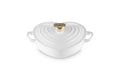 White heart shaped 1.25 qt cocotte with handles and a light gold heart knob displayed on a white background