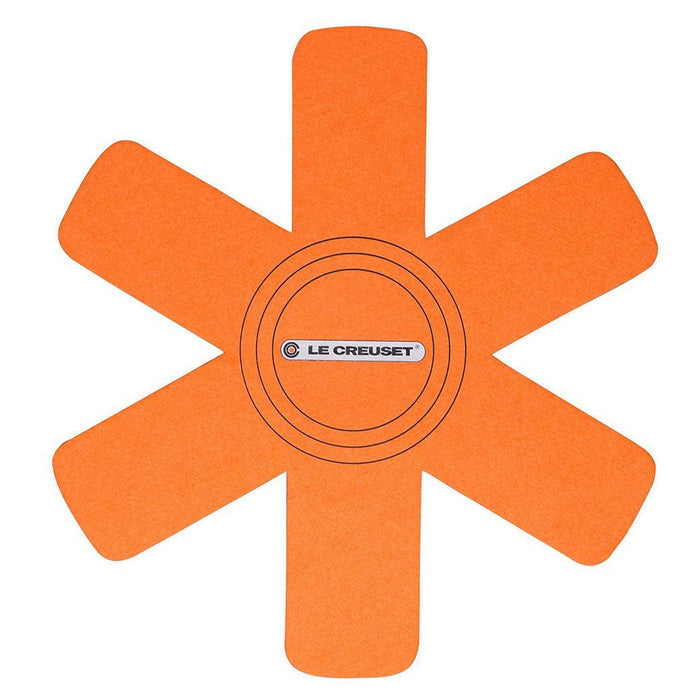 Top view of flame Le Creuset Felt Pan Protector displayed on a white background
