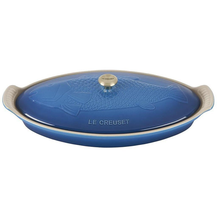 Marseille ceramic dish with fish design and 'Le Creuset' branding on a white background