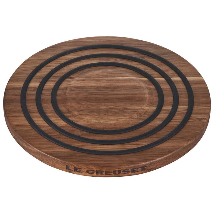 Le Creuset magnetic wooden trivet displayed on a white background
