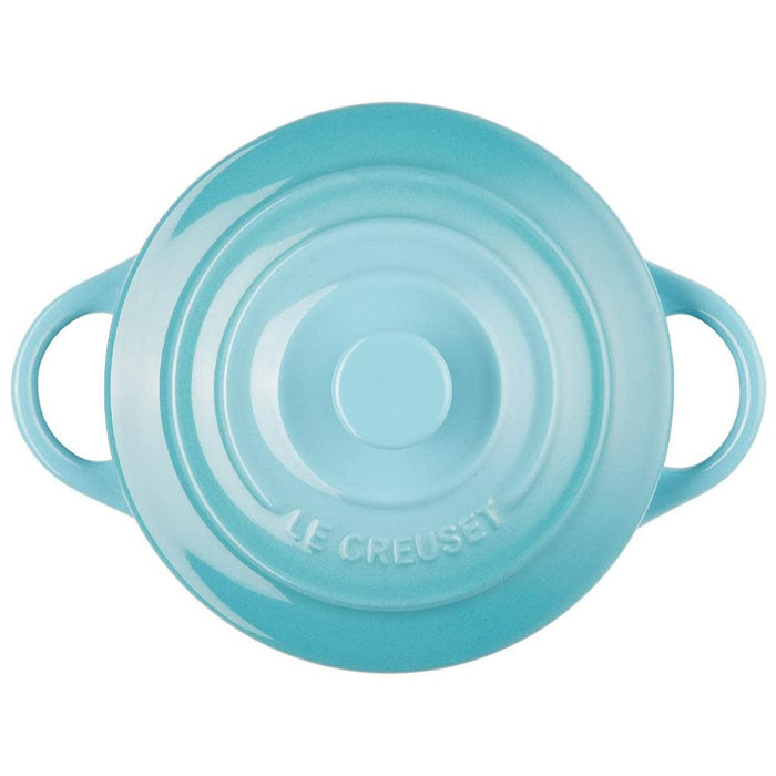 Top view Caribbean Le Creuset Mini Round Cocotte 8 oz displayed on a white background