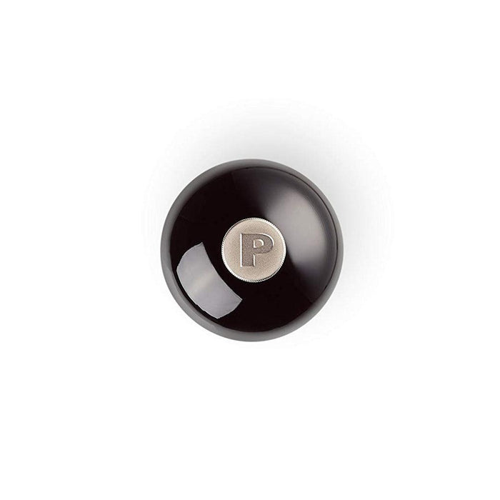 Top view of Black Le Creuset Pepper Mill displayed on a white background