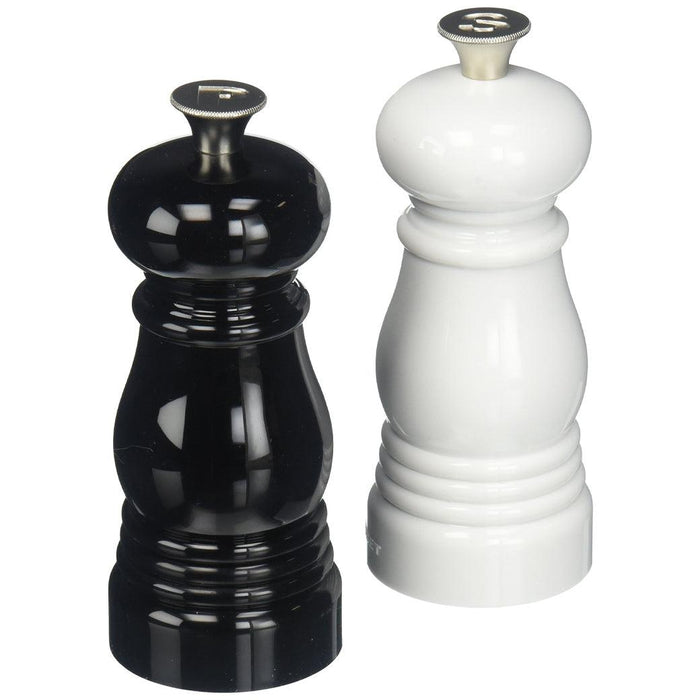 Black and white Le Creuset Petite Salt and Pepper Mill Set displayed on a white background