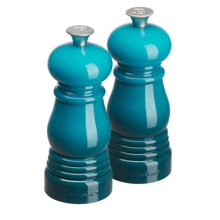 Caribbean Le Creuset Petite Salt and Pepper Mill Set displayed on a white background