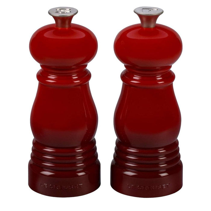 Front view of Cerise Le Creuset Petite Salt and Pepper Mill Set displayed on a white background