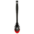Cerise Le Creuset Revolution Bi-Material Pasta Spoon displayed vertically on a white background