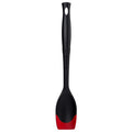 Cerise Le Creuset Revolution Bi-Material Saute Spoon displayed vertically on a white background