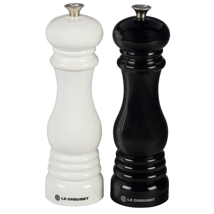Front view of Le Creuset Salt and Pepper Mill Set of black and white displayed on a white background