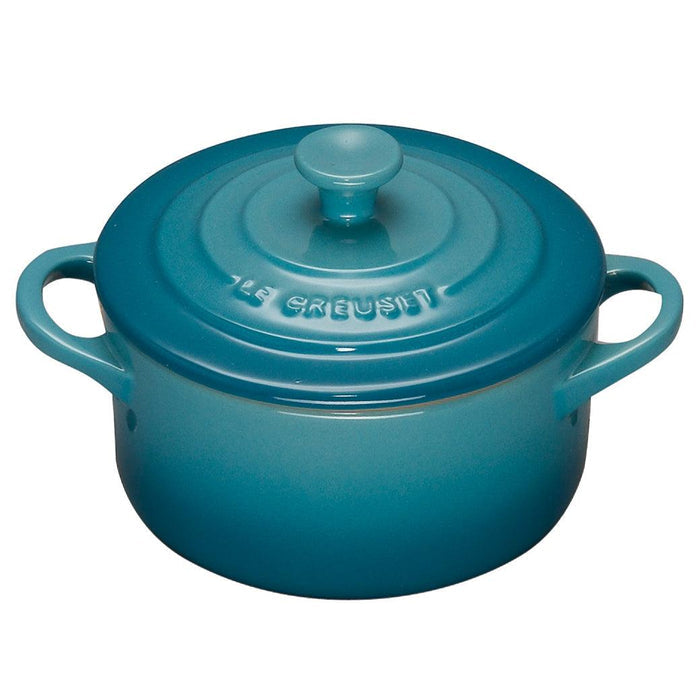 Caribbean Le Creuset Cocottes with lid displayed on a white background