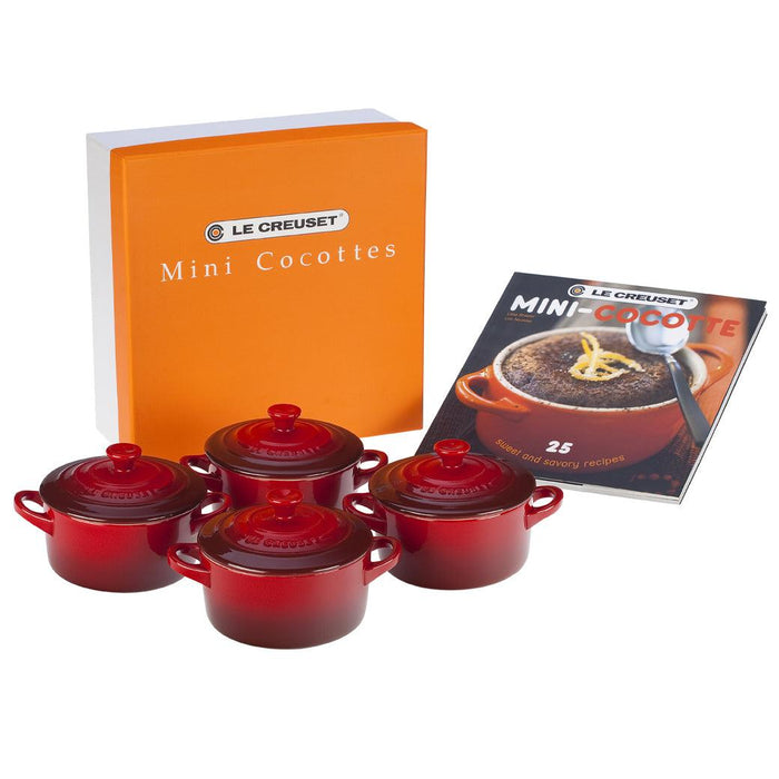 Cerise Le Creuset Set of 4 Cocottes w/ Mini-Cocotte Cookbook displayed on a white background