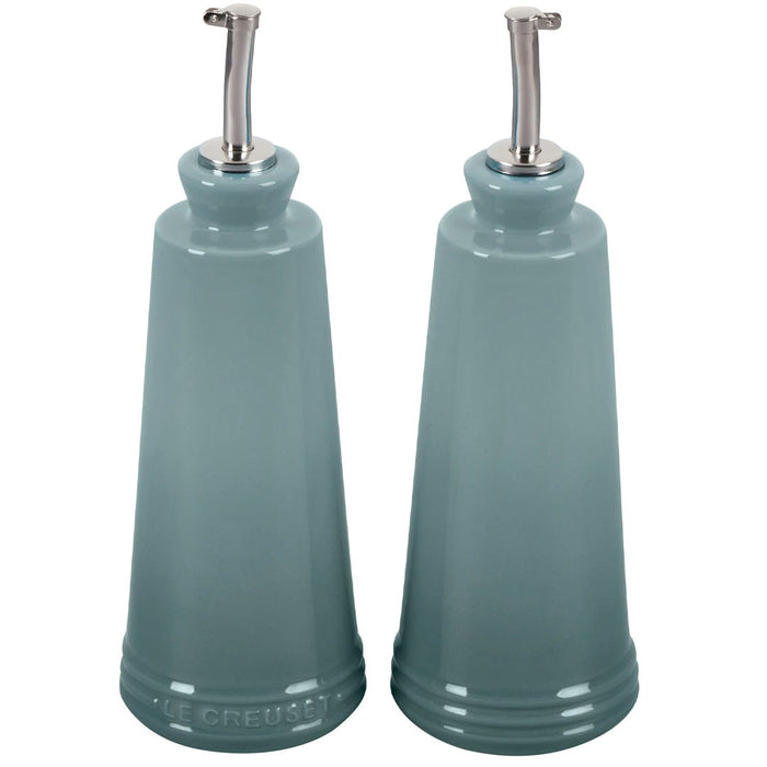 Front view of sea salt Le Creuset signature oil and vinegar set displayed on a white background