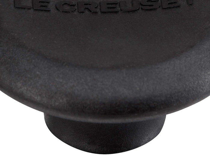 Close up of Le Creuset Signature Phenolic Knob displayed on a white background