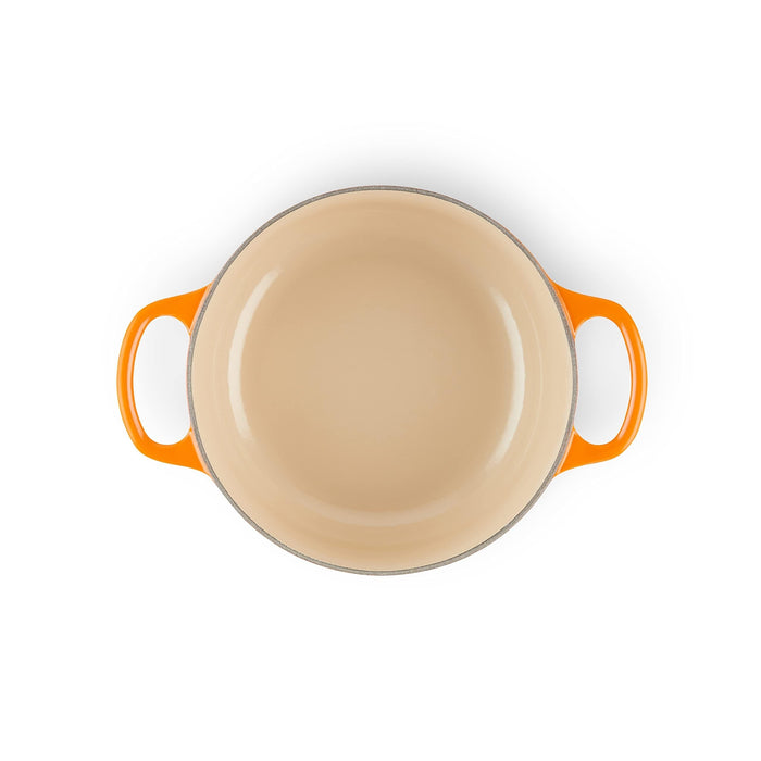Top view flame Le Creuset Signature Round 2 Qt. Dutch Oven displayed on a white background