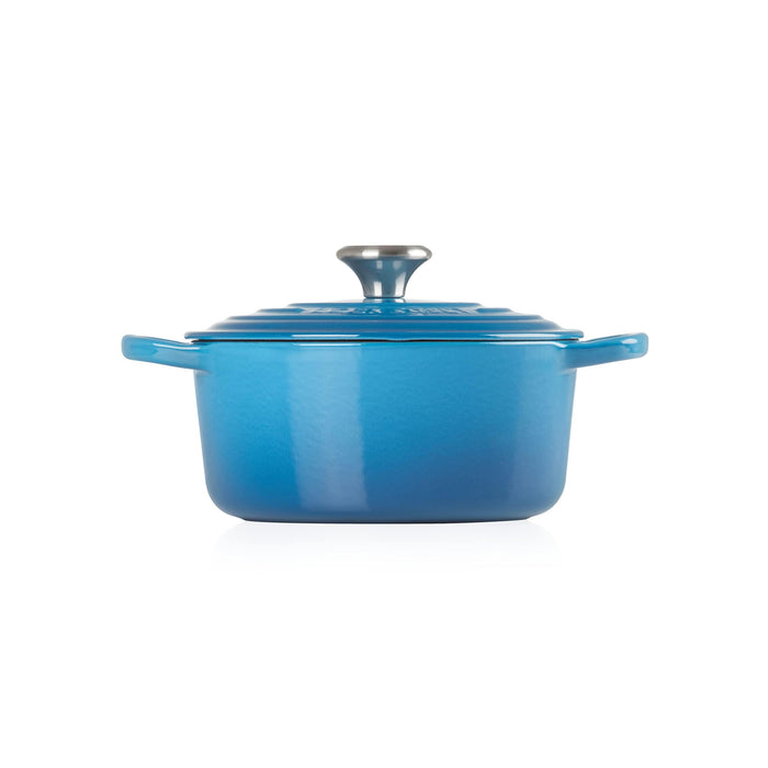 Side view of Marseille Le Creuset Signature Round 2 Qt. Dutch Oven with lid displayed on a white background