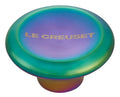 Steel iridescent knob with 'Le Creuset' branding on a white background