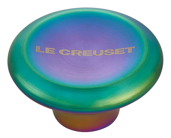 Steel iridescent knob with 'Le Creuset' branding on a white background