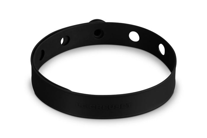 Black silicone cookware travel latch on a white background