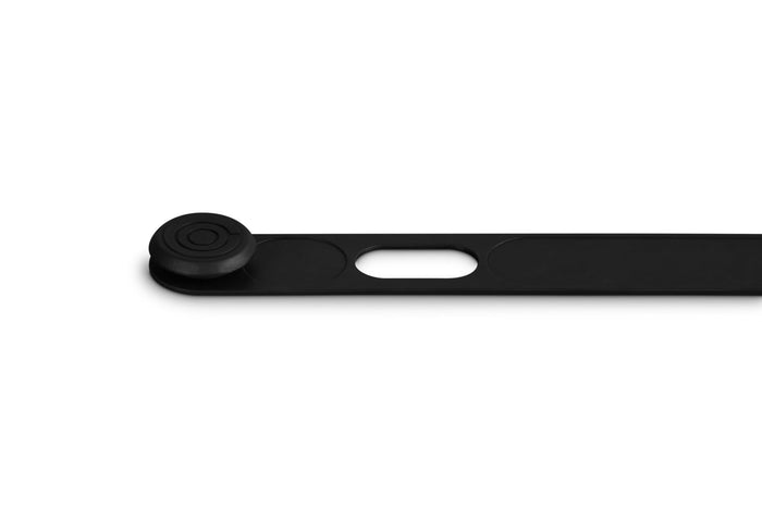 Black silicone cookware travel latch on a white background