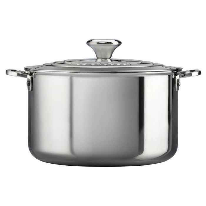 Side view of Le Creuset Stainless Steel 7 qt. Stockpot with Lid displayed on a white background
