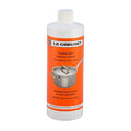 Le Creuset stainless steel cookware cleaner bottle on a white background