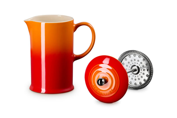Flame Le Creuset Stoneware French Press, 34 oz. with attachment on the side displayed on a white background