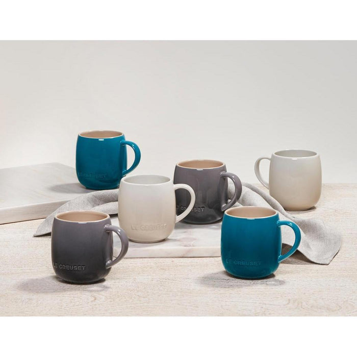 A colorful assortment of 13 oz Le Creuset stoneware heritage mugs