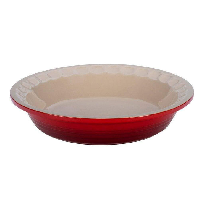 Cerise Le Creuset Stoneware Pie Dish displayed on a white background