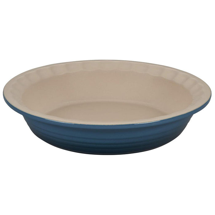 Deep teal Le Creuset Stoneware Pie Dish displayed on a white background