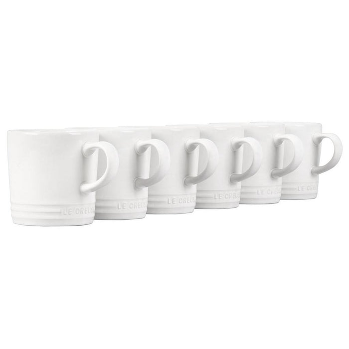 Set of 6 12 oz white Le Creuset stoneware London mugs displayed on a white background