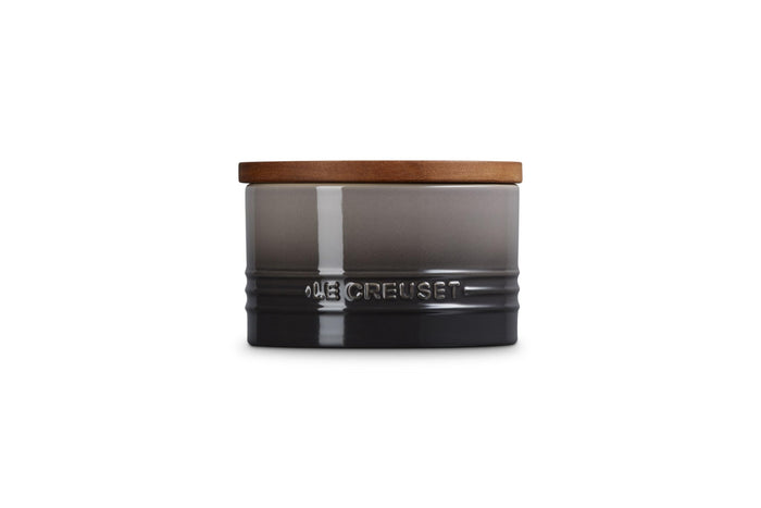 Oyster 16oz Le Creuset Stoneware Signature Canister with a wood lid on a white background